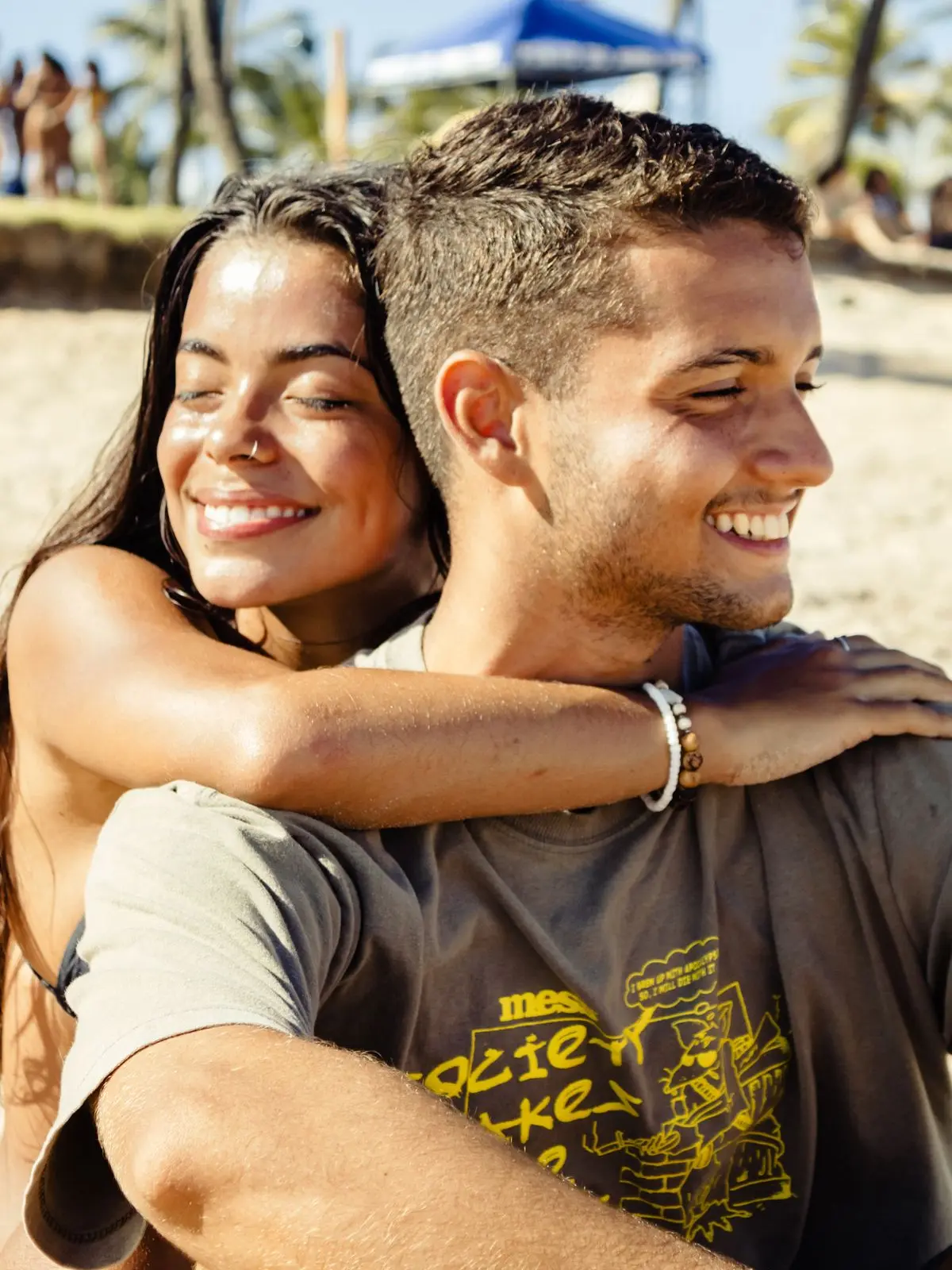 A couple enjoying an easy moment together by the shore